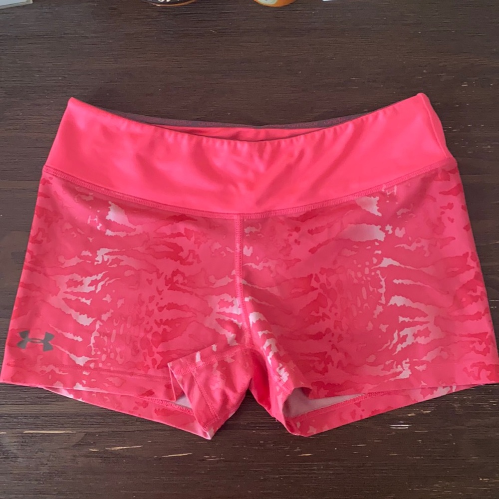 Pink Under Armour spandex.